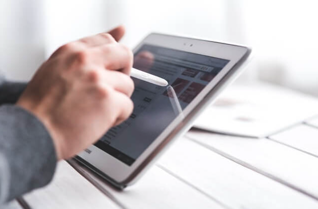 Lawyer using a tablet in their paperless lawfirm