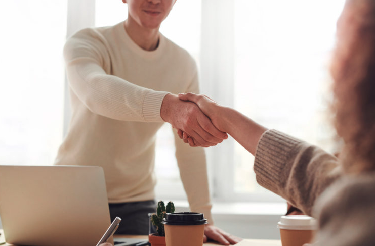 A law firm branding consultant meeting with a client