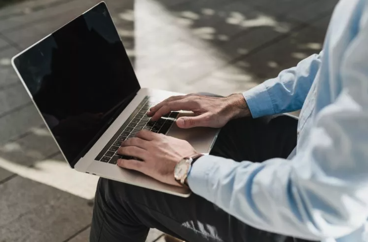 lawyer working on a mac laptop