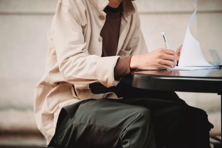 Person studying for the law exam at a table