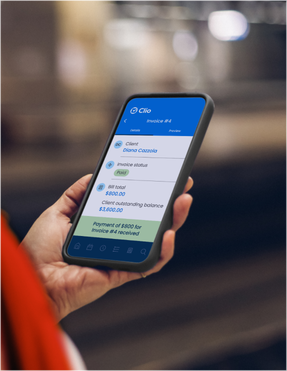 A person managing their legal cases on the go with the Clio mobile app.
