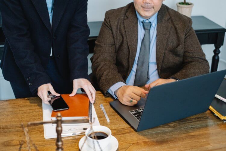 Lawyers filling out form 2848