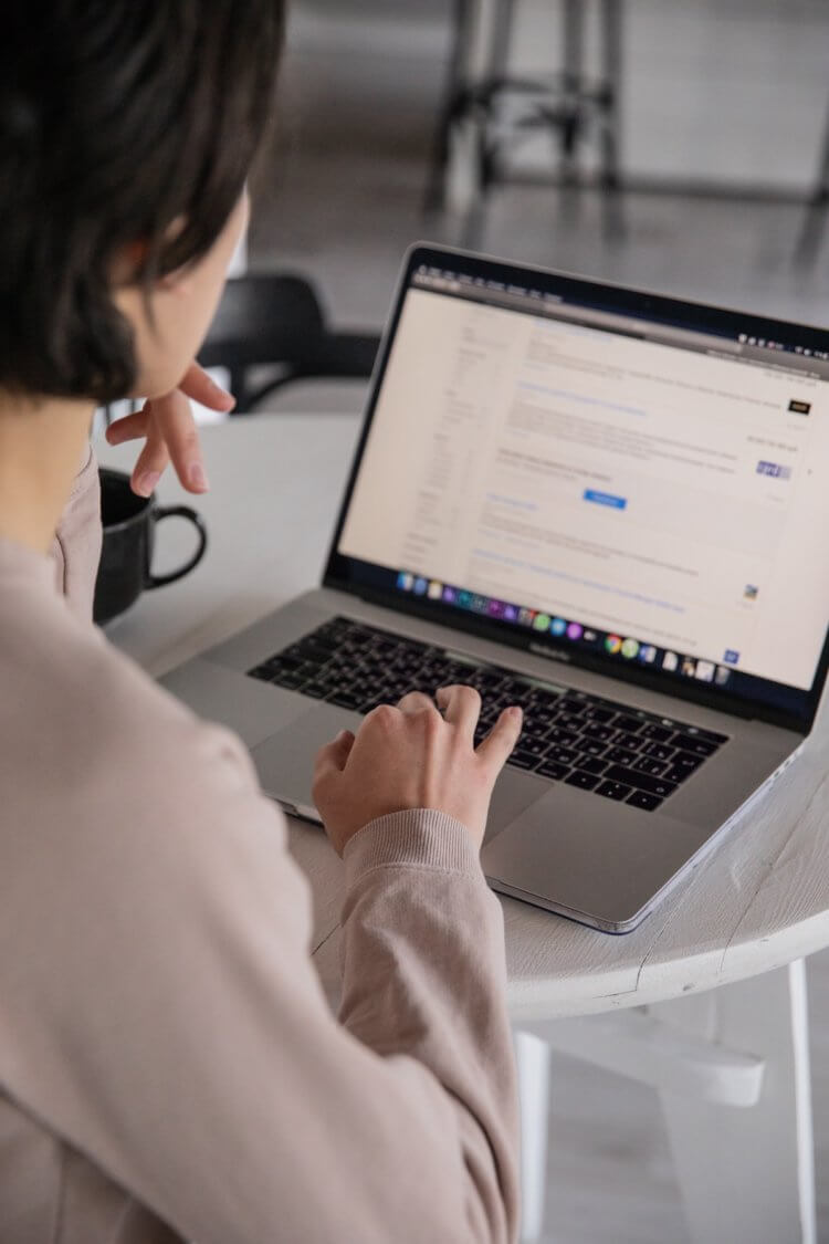 Person reviewing law firm website on a laptop