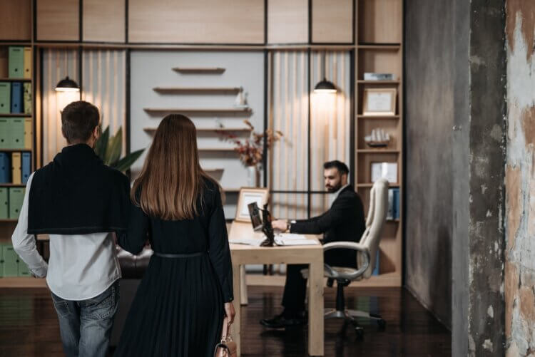 Clients entering a lawyer's office for legal services